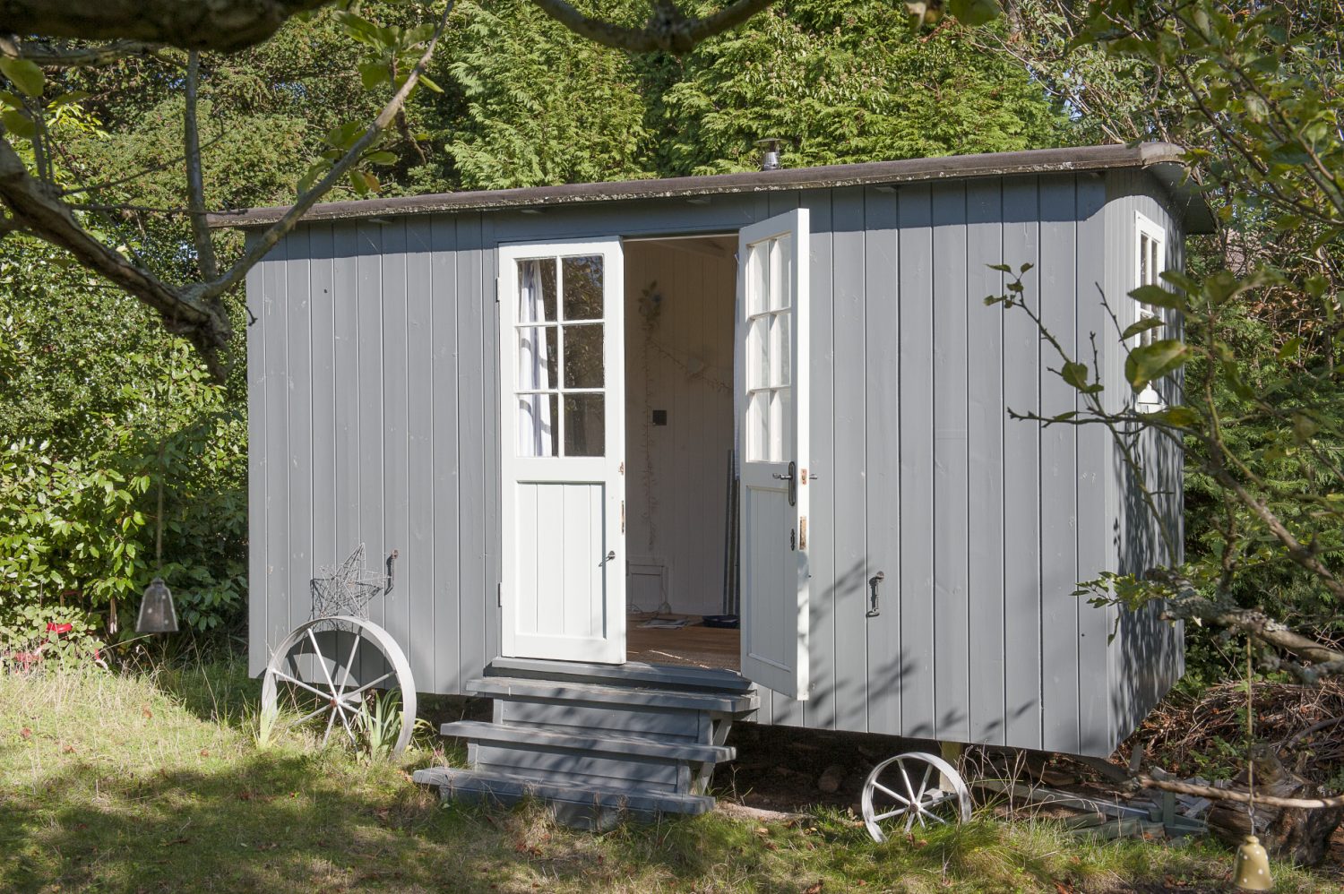 Outside, a shepherd’s hut acts as a retreat for the family