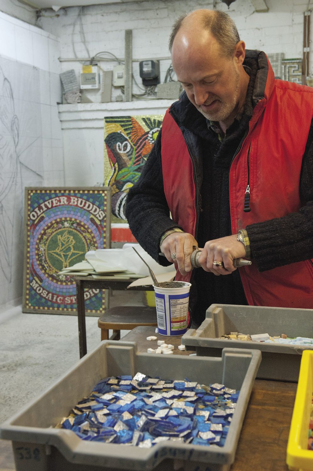 Oliver at work in his Bodiam-based studio. He is currently working on the restoration of the JF Kennedy memorial mosaic that was in Birmingham. Commissioned by the city’s Irish Catholic community some time after Kennedy’s assassination in ’63, is was originally unveiled by his father in 1969