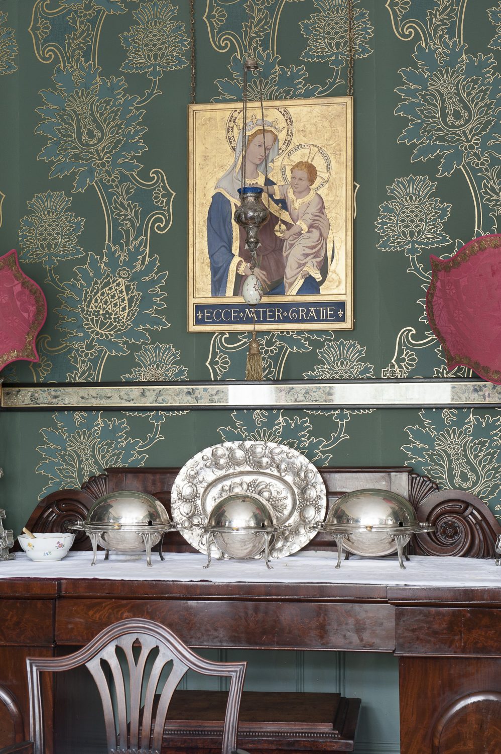 Part of the St. Benedict experience is breakfast in the dining room just across the hall from the drawing room, resplendent with green and gold Watts of Westminster wallpaper and a crystal chandelier, served in silver chafing dishes in the English country house manner