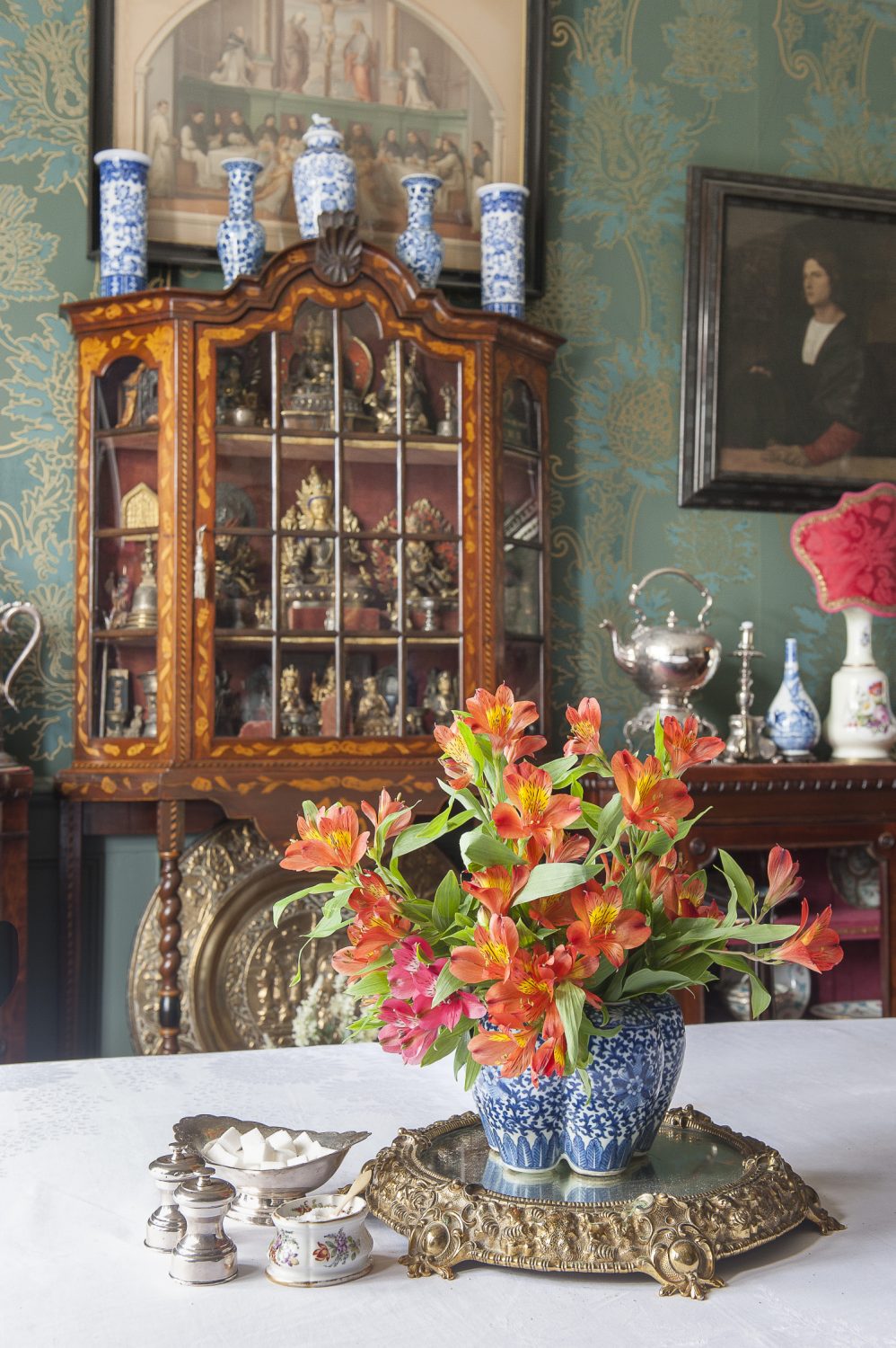 Part of the St. Benedict experience is breakfast in the dining room just across the hall from the drawing room, resplendent with green and gold Watts of Westminster wallpaper and a crystal chandelier, served in silver chafing dishes in the English country house manner