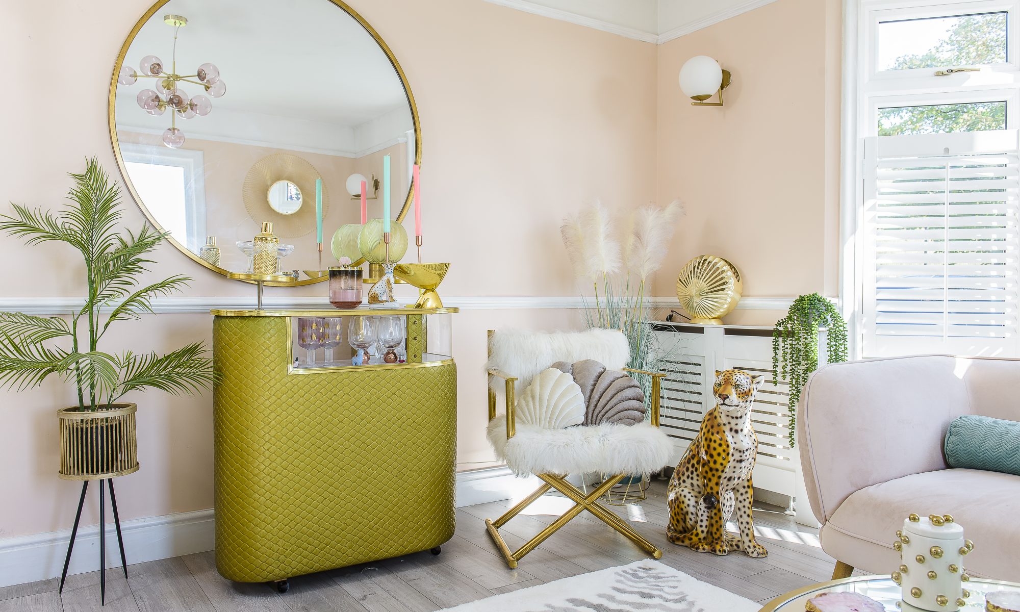 The sitting room is home to a quilted gold cocktail bar – a vintage find from Margate, sourced via Instagram. With a core palette of blush pinks and gold, Cat brought many of the room’s decor back from her shopping trips to HomeSense