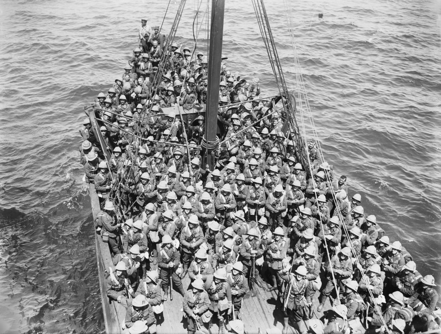 Soldiers of the Lancashire Fusiliers, 29th Division, are seen on board an old Royal Navy battleship used in the third phase of operations in the Dardanelles Straits before they disembarked at ‘W’ and ‘V’ beaches off Cape Helles on 5 May 1915