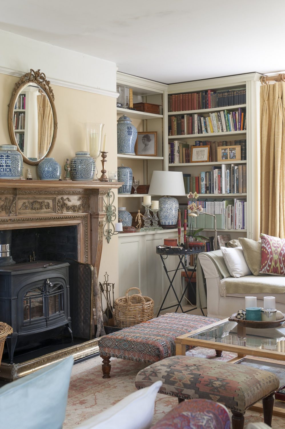 The sitting room is painted and decorated in shades of pale apricot with splashes of a heavenly soft pale green