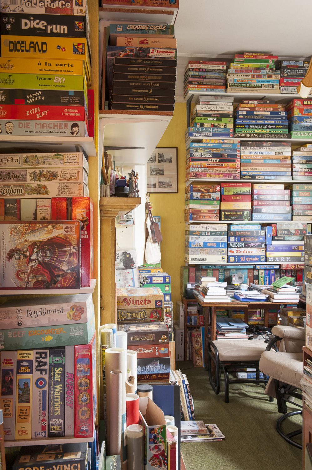 Mick’s study is packed from floor to ceiling with his collection of board games