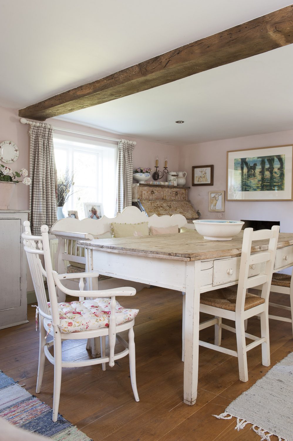 Caroline is a regular visitor to the Ardingly antiques market, where she bought this large, French-style farmhouse table and other accessories that decorate the large living area at the front of the house