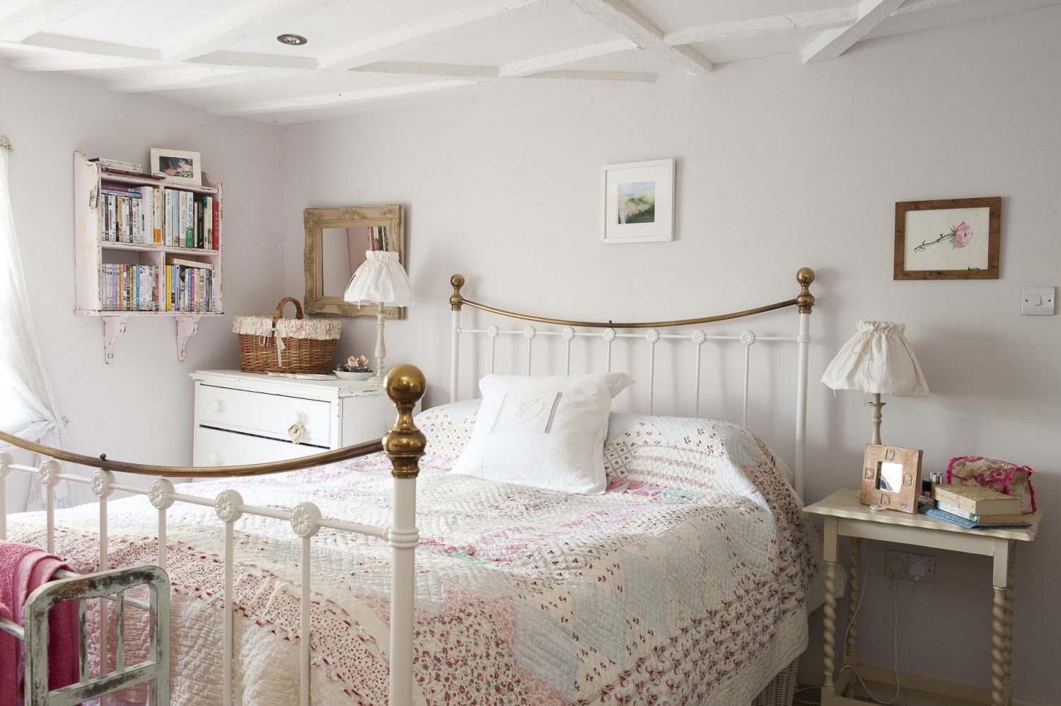 Personal touches such as family photos, favourite books and paintings add interest to the carefully decorated and designed bedrooms. The whole ceiling has been painted white, where once the beams were painted black – giving a sense of light and space