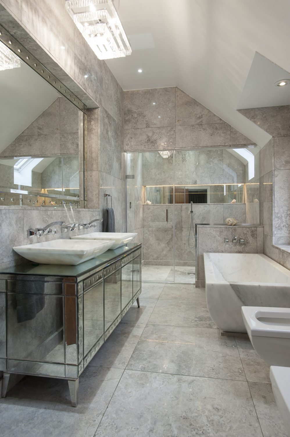 The bathroom with its part-vaulted ceiling is superb, its centrepiece a huge bath cut from a single block of Turkish marble...
