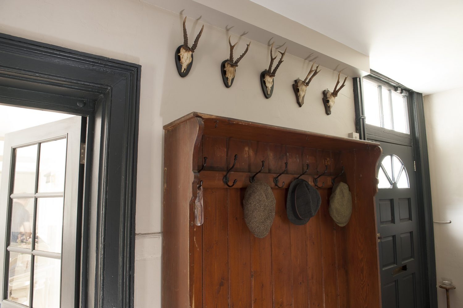 A collection of tweed flat caps adorn the pegs in the rear hallway – ready and waiting for a walk in the surrounding countryside. The couple are happy to arrange guided walks for visitors