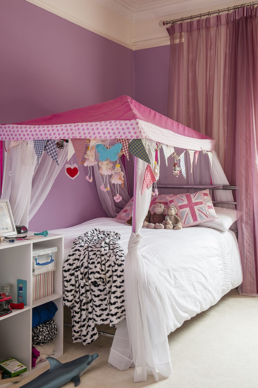 Daughter Katie’s room is a paradise of pink and purple, complete with bunk beds to make it an ideal room for girly sleepovers