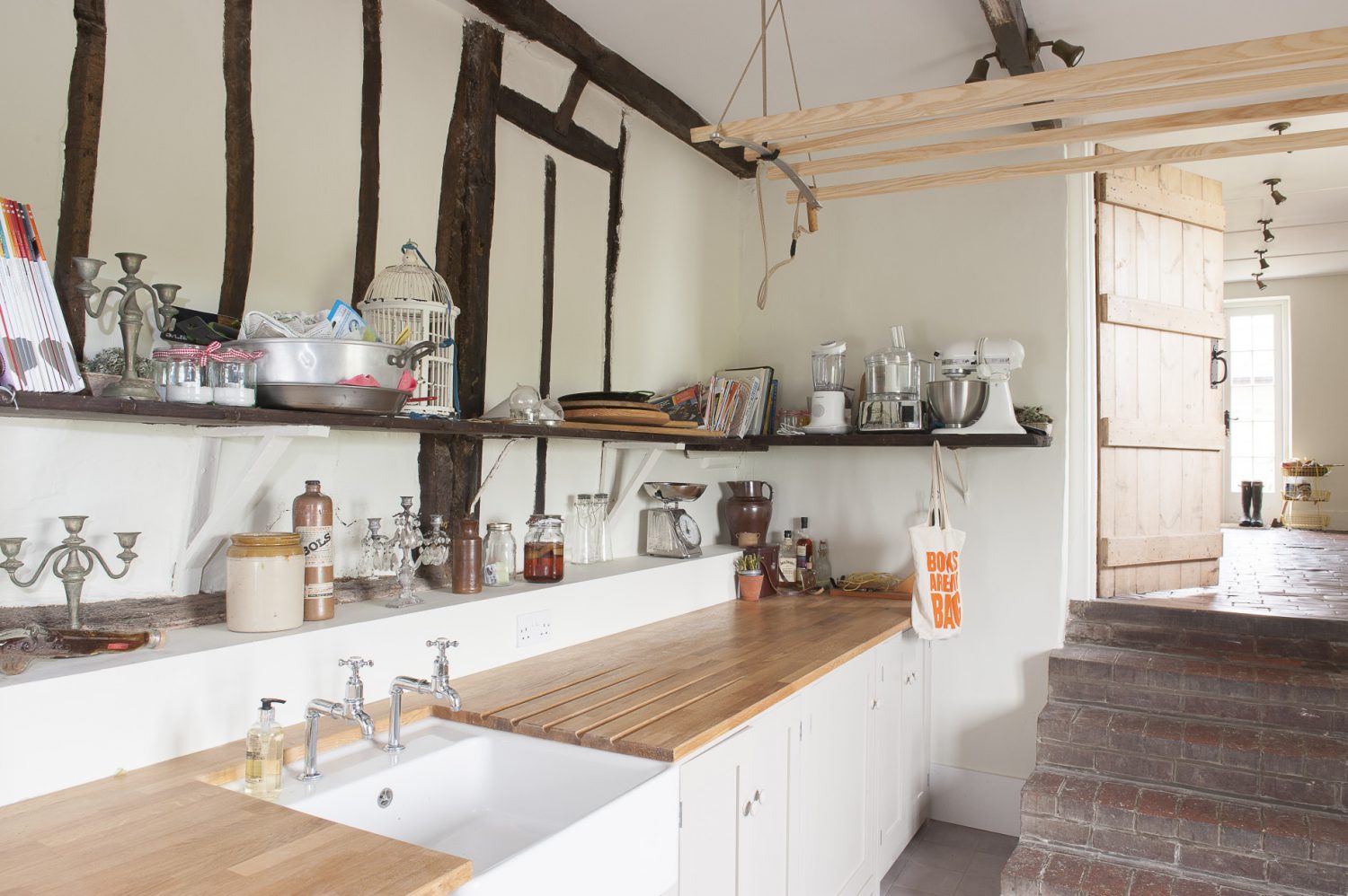The utility room was in a pretty sorry state when the couple first moved in. It now serves as a storage space for preserves and other perishable kitchen items