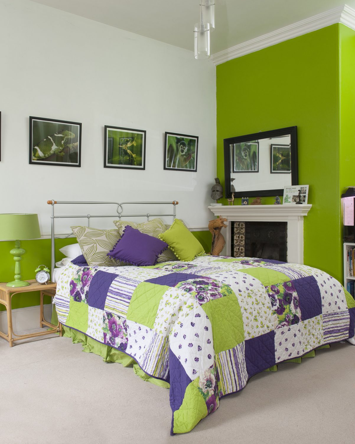 The lime green walls in Dawn’s eldest son’s room are perfectly complemented with a purple Ragged Rose patchwork quilt and pom-pom edged cushions