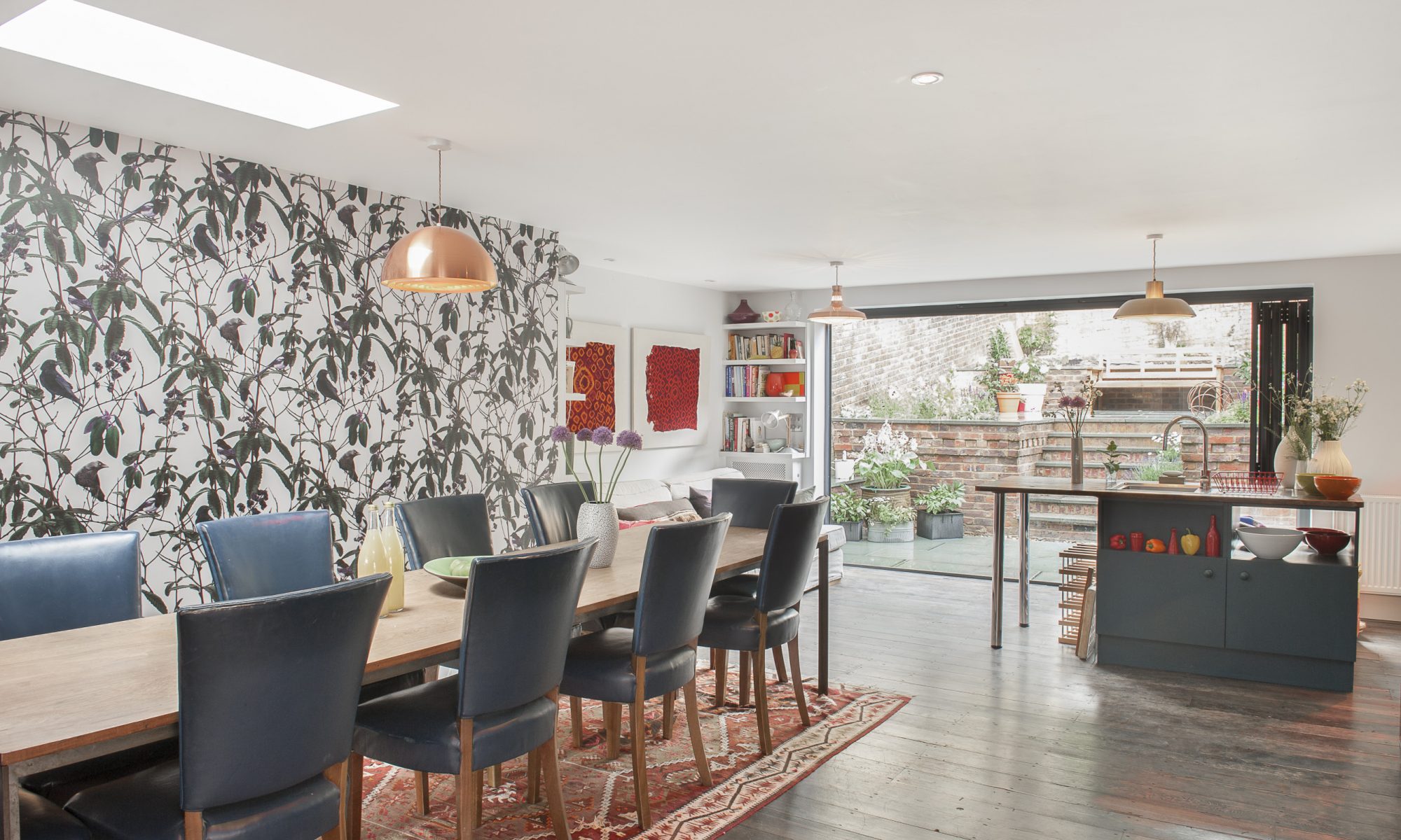 With inspiring views looking out to sea and glorious opened-up spaces within, Ginny and MJ have made a commanding terrace house in Hastings as harmonious as the choirs they run
