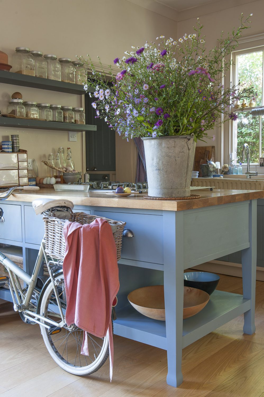 Francine’s much-loved 1960s bicycle, which she bought locally, is perfect for nipping to the shops. It lives in the kitchen, propped up against a kitchen unit built by Francine’s son Jacques