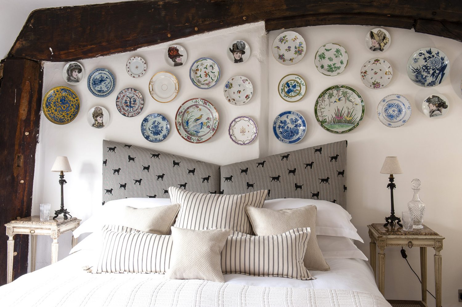 Using his grandmother’s Herend pieces as a start, Matthew has gathered a superb collection of porcelain plates which now hang above the upholstered bedhead in Labrador
