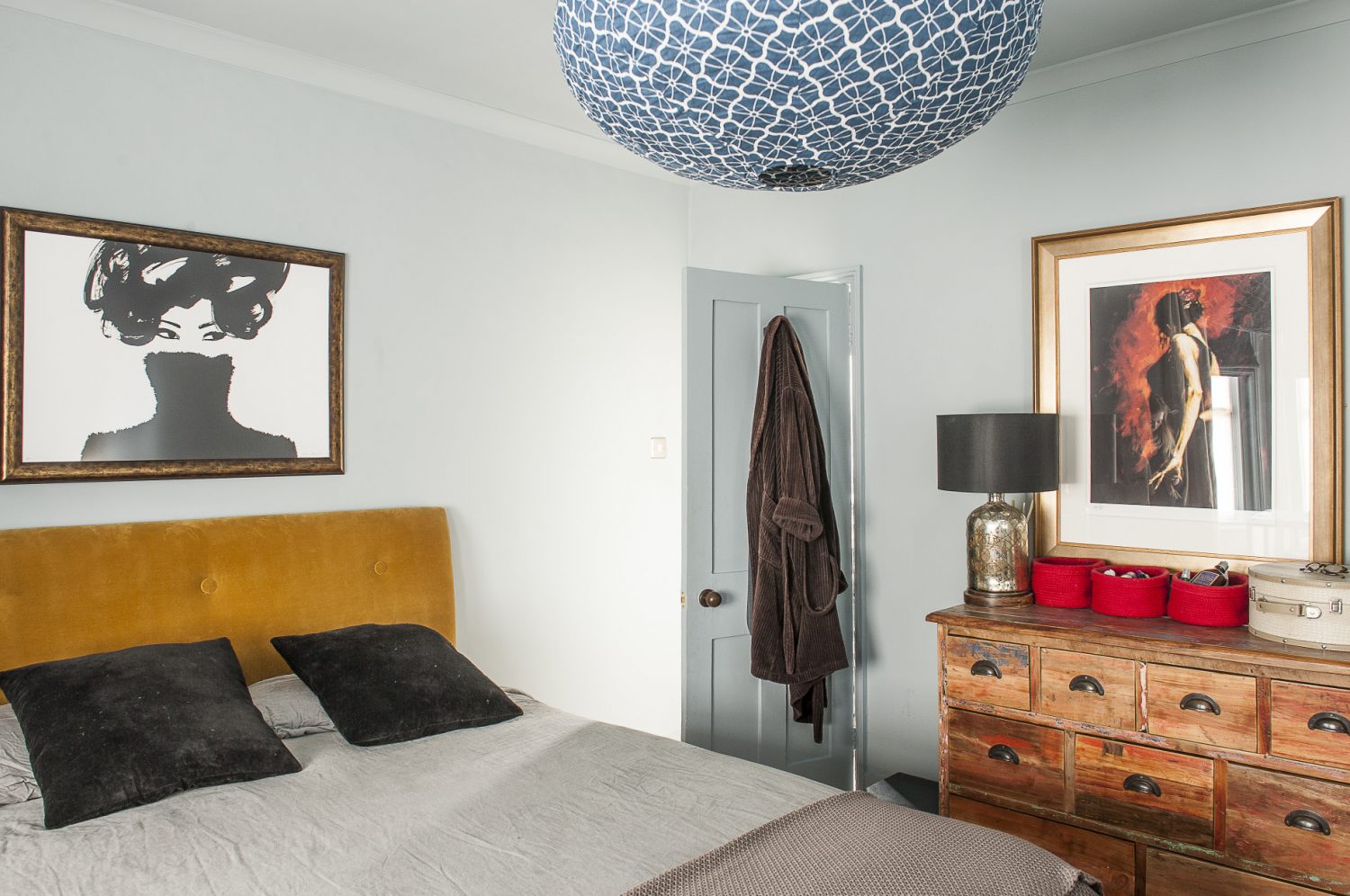 The master bedroom is painted in Bone China by Little Greene with a striking light fitting from Gong Lighting – who specialise in vintage ideas with a twist