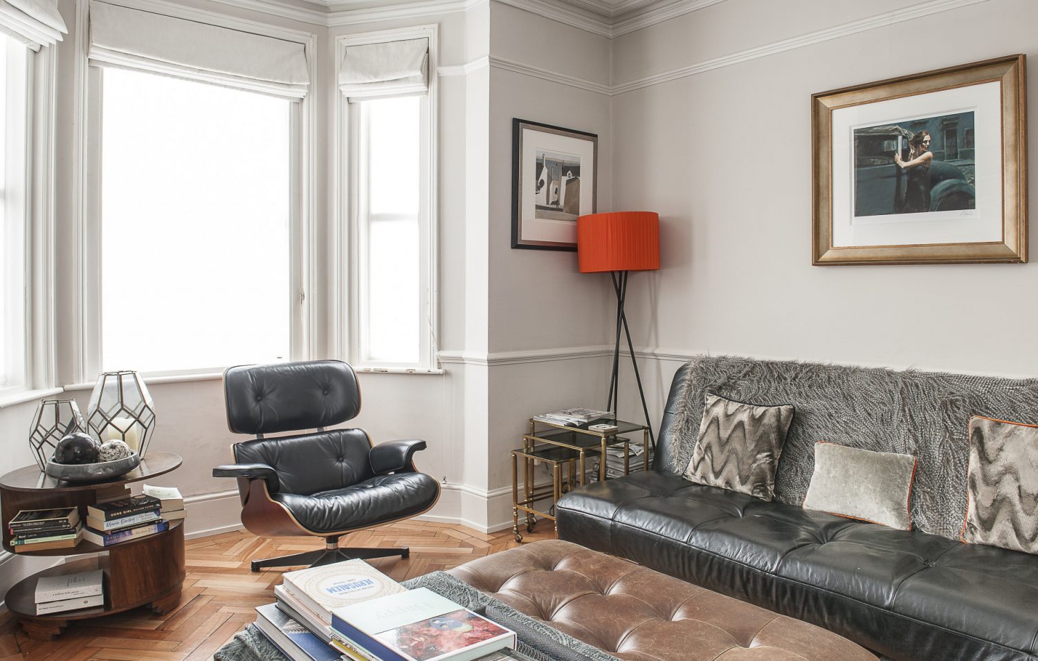 Justine describes the living room, which is at the front of the house, as a ‘work in progress’. Even so, the subtle paint scheme and signature pieces of furniture, including a Charles Eames chair and a Hans Wegner rocker, give it understated style