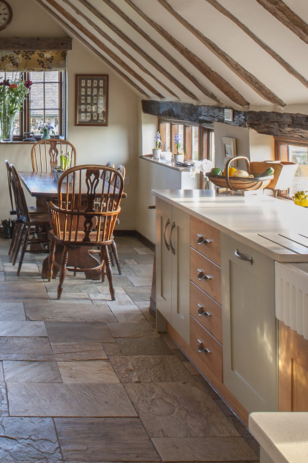 The kitchen’s flag-stone floor was already in place when the couple bought the farmhouse and is ideal in a household where visitors often have muddy wellies – or muddy paws