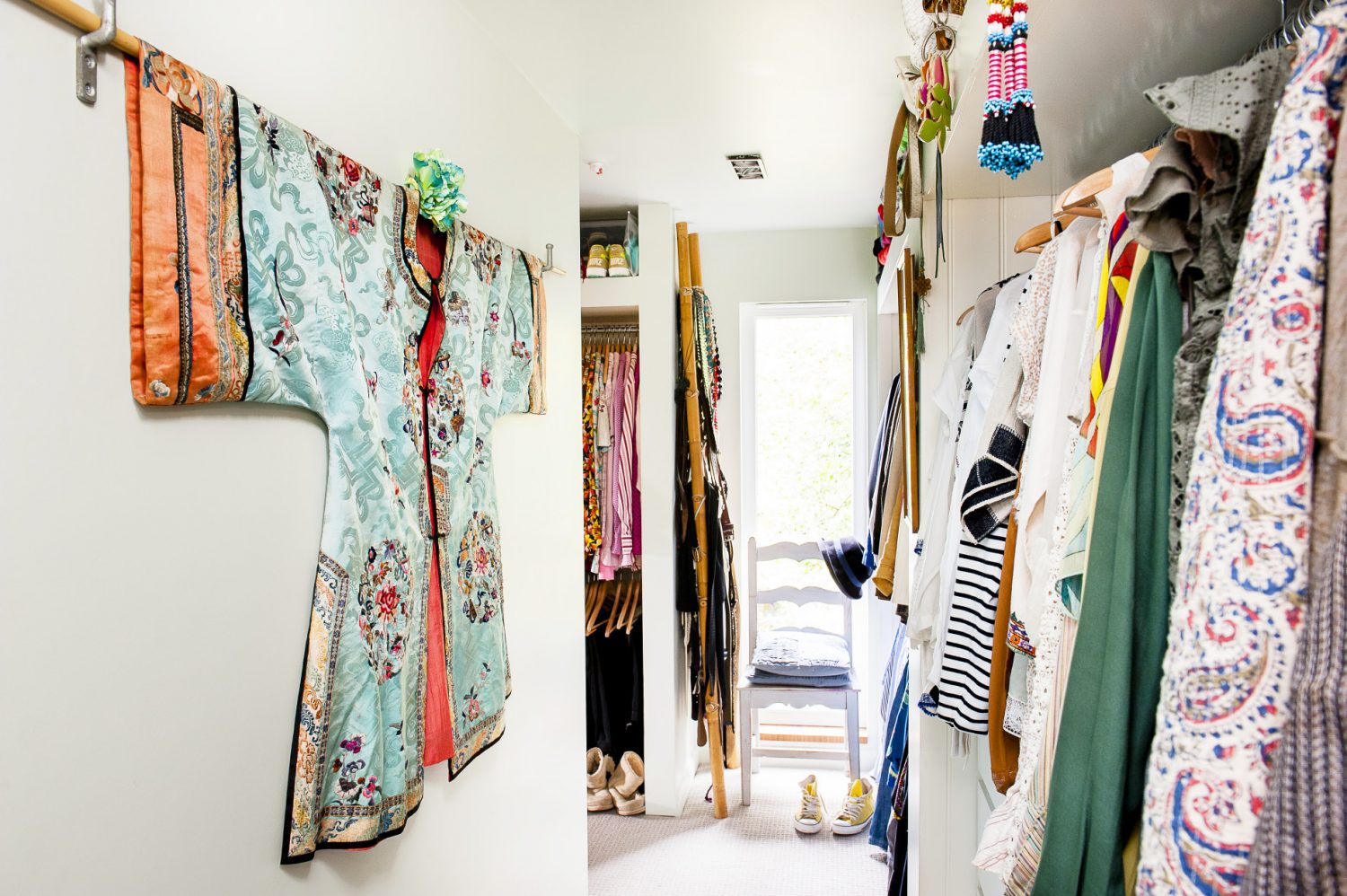 A kimono hangs on the wall of the dressing room