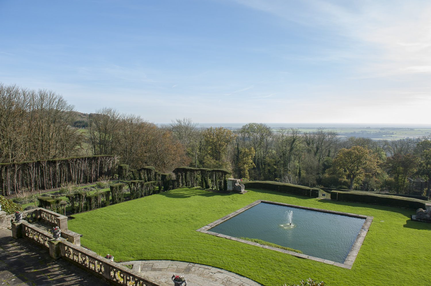 The bedrooms benefit from stunning views across the extensive gardens and out towards the sea. The grounds have been restored to virtually their former glory