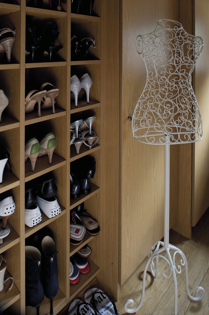 The shelves of Candy’s dressing room are home to an enviable collection of shoes