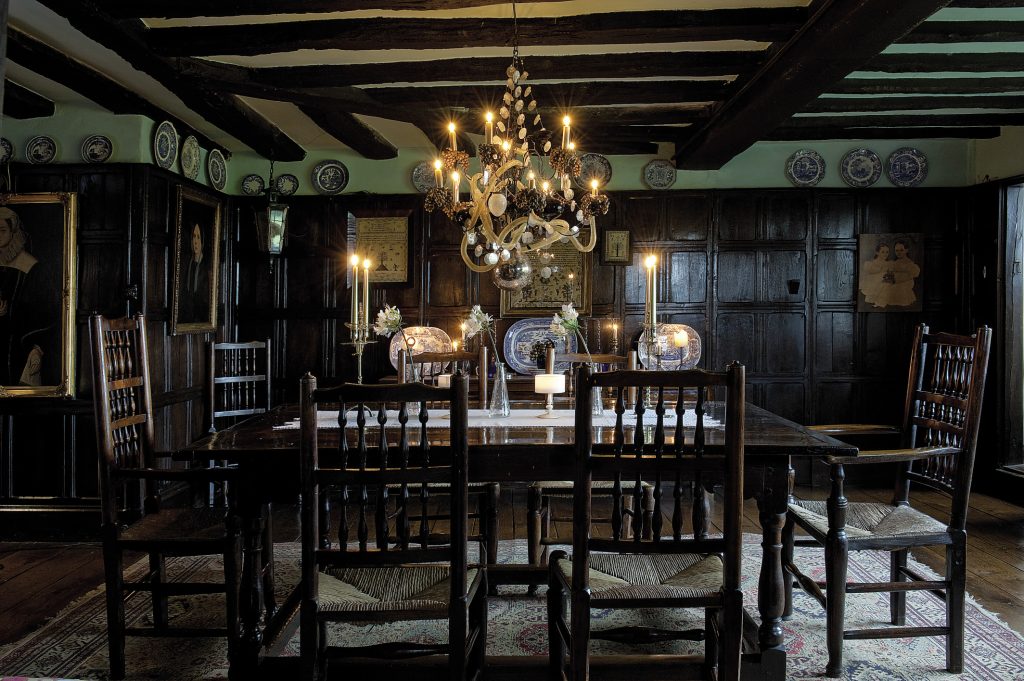 Off the drawing room is the panelled dining room, centrepiece of which is a wonderful 1720 oak dining table. Louisa can be so certain of the date because it was originally commissioned for New Romney Town Hall as a Judge’s Table when the area was granted permission to try – and execute – smugglers