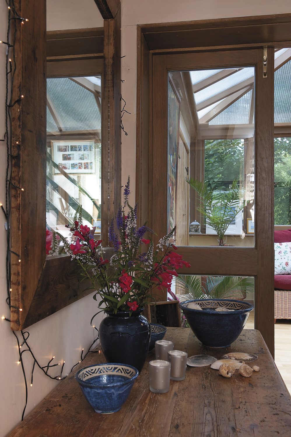 the Wildings added the delightful conservatory which is Christine’s favourite summer spot, where she will sit with a cup of tea, a good book and one of the cats!