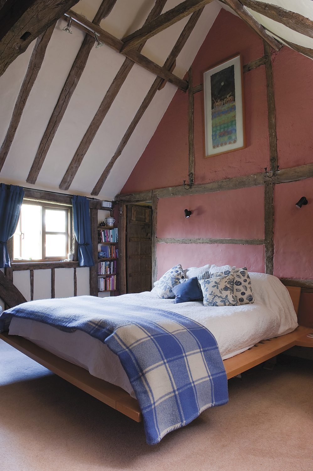 and so to sleep...the magnificent vaulted bedroom is a gem, with exposed timber, the fireplace and wobbly floor