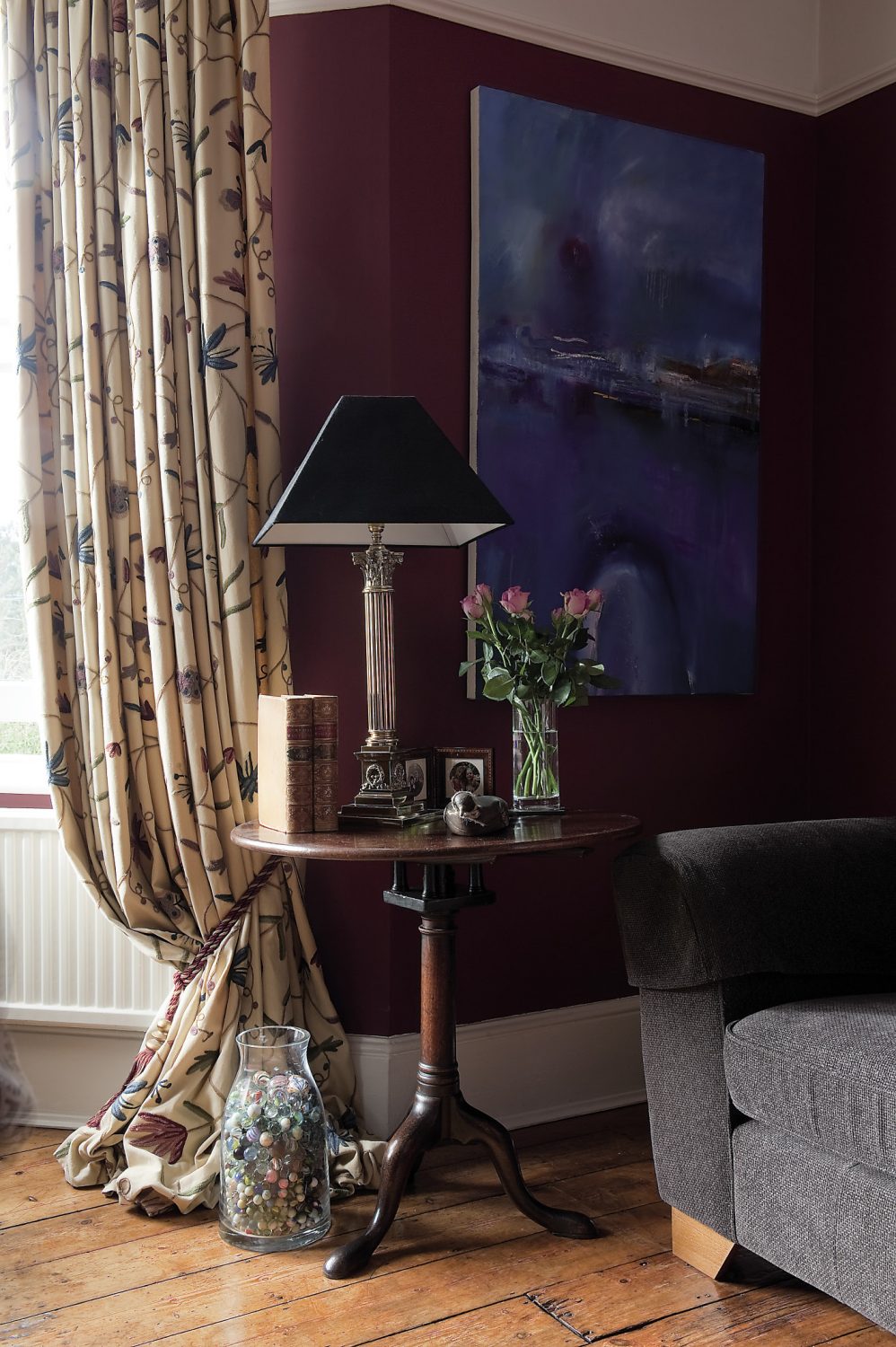 The fire blazes away in the sitting room with its magnificent marble surround and classic late Regency/early Victorian grate. An ornate gilded mirror stands on the mantelshelf along with storm lanterns and scented candles to perfume the air
