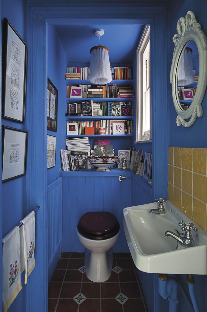 the loo, which doubles as a library and art gallery is Maggie’s favourite room in the house