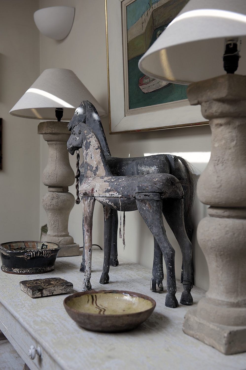 James’ house is filled with artworks, ornaments and curios, the most striking of which are a pair of toy wooden horses