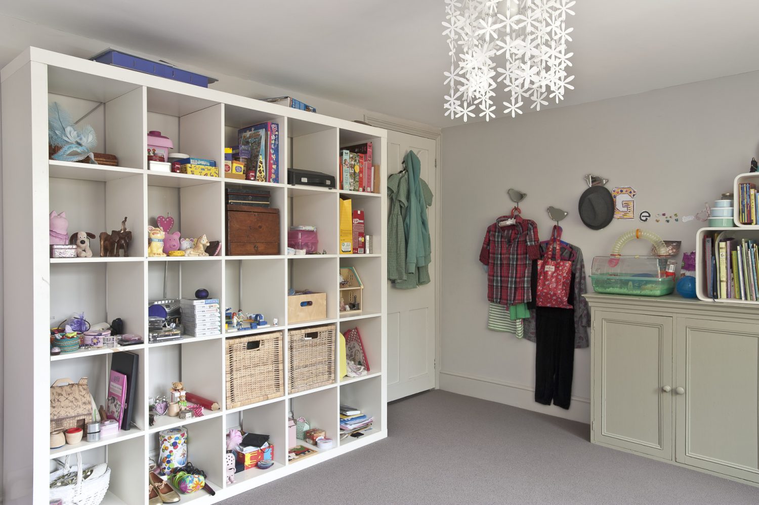 modular storage unit provides an attractive display whilst at the same time keeping the floor free of clutter