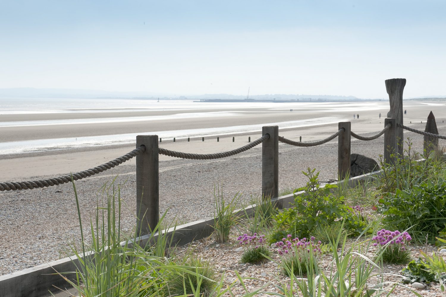 At the far end of the garden there is a sea defence with timber uprights linked by rope made at Chatham Dockyard. The plants were chosen in association with Natural England so that they would complement the beach and dunes that are classified and protected as a Site of Special Scientific Interest