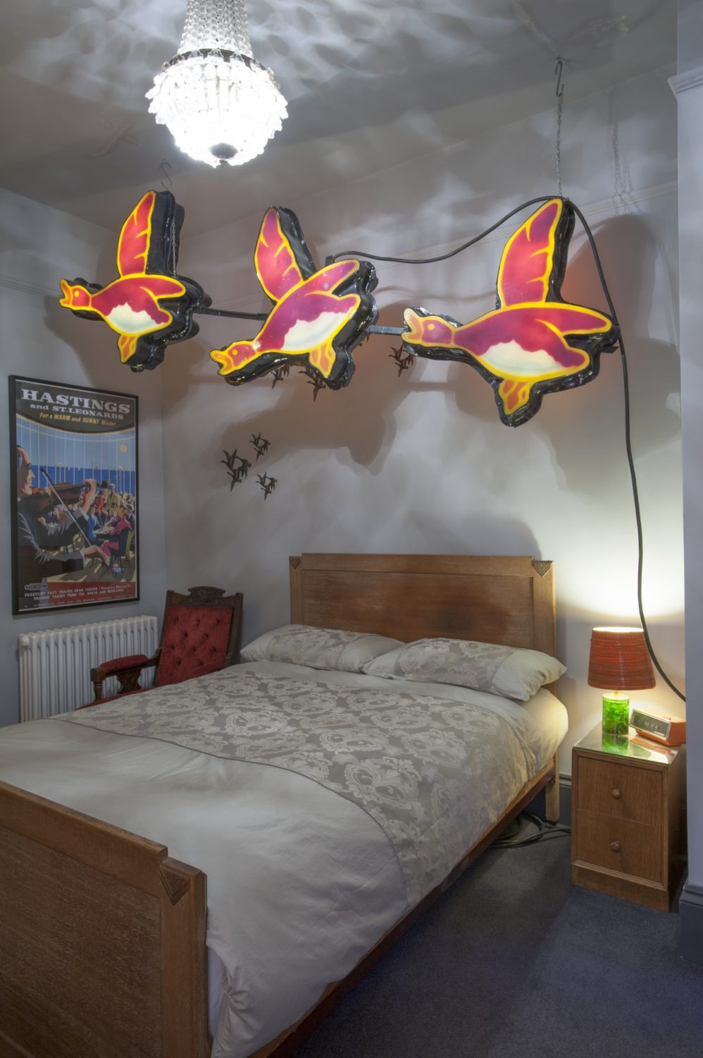 Next to the sitting room, in the first of two guest bedrooms, Philip’s passion for Blackpool Illuminations is again given full reign in the shape of three spectacular flying ducks