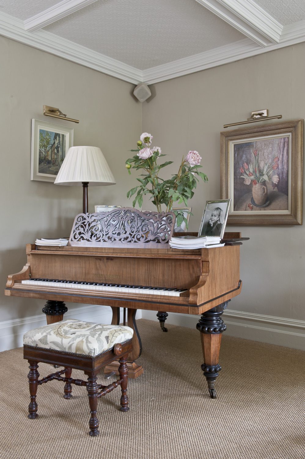 To the left of the piano hangs a painting by Karl Terry, an artist that Belinda particularly admires. As well as being an acclaimed local artist, Karl is also known as a roofing expert with a specialist knowledge of Kent pegs