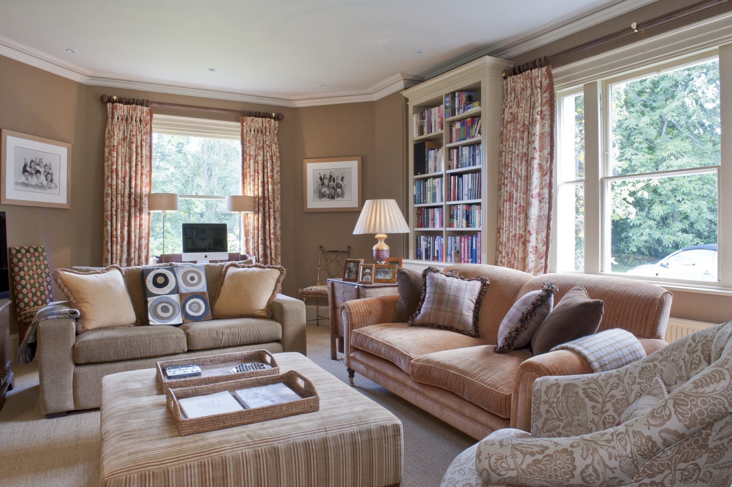 Belinda had the larger sofa in the snug re-upholstered in Lelièvre mogadore velvet so that it is fresh yet still looks like a loved family piece. The walls are hung with Casamance wallpaper giving the room the warmth and appearance of being fabric-lined.