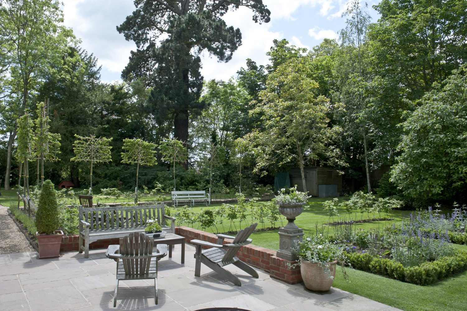 Jo Thompson, a Chelsea gold-medallist, has re-designed the garden for Belinda. Jo’s design includes a parterre leading off the terrace, the original of which has been extended to provide a larger seating area