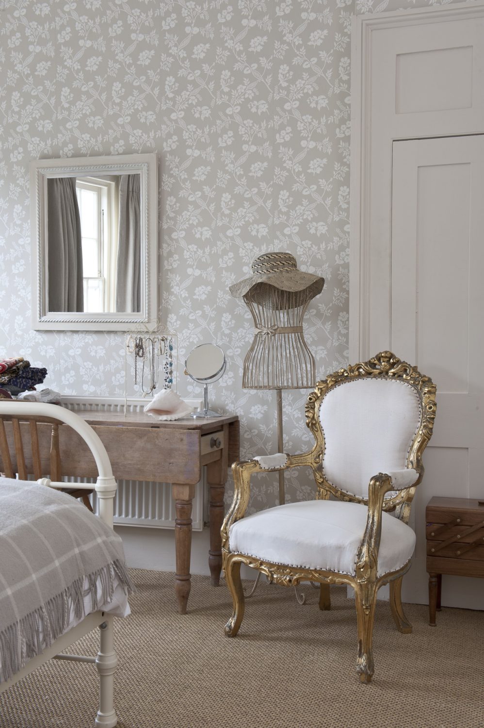 Colefax and Fowler wallpaper takes centre stage in one of Belinda’s daughters’ rooms