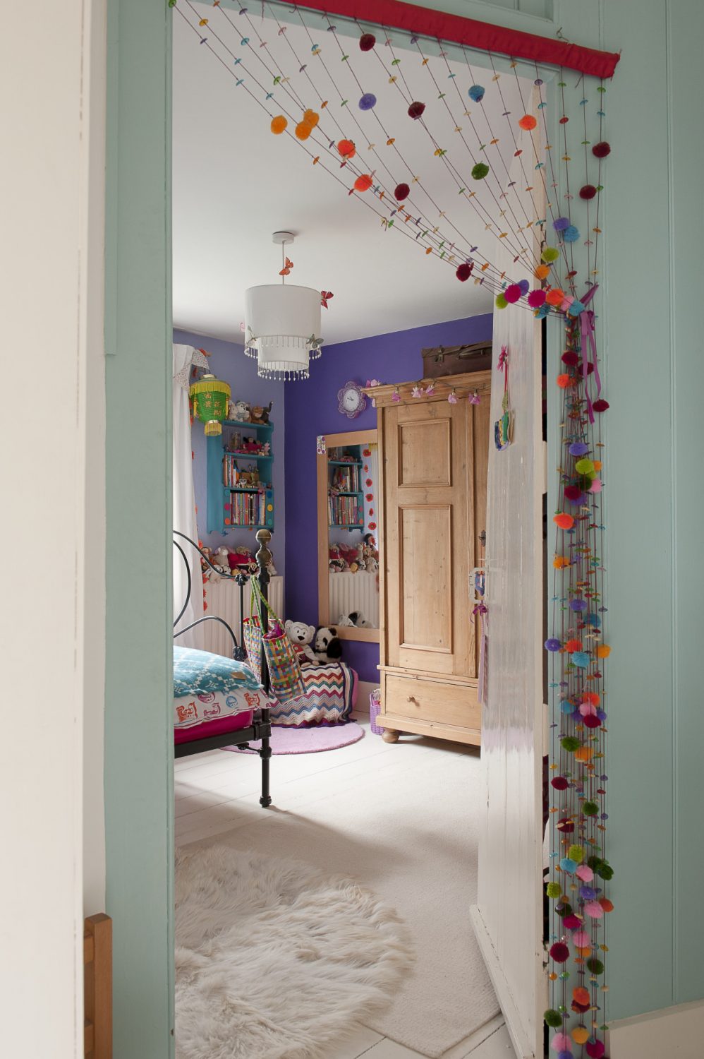 Daughter Gabrielle’s room is just as colourful as her sibling Dominic’s and features a bold floral mural on one wall