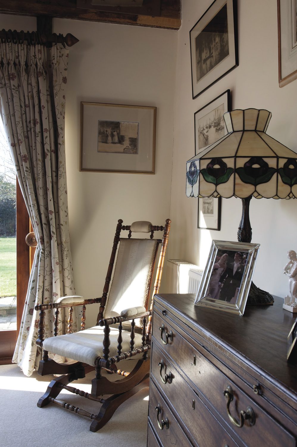The cosy drawing room is the heart of the home where the whole family gather together to sit in front of the fire with a bottle of wine. “We’re fortunate because the children come back here often and I think the house has quite a lot to do with that,” says Daphne