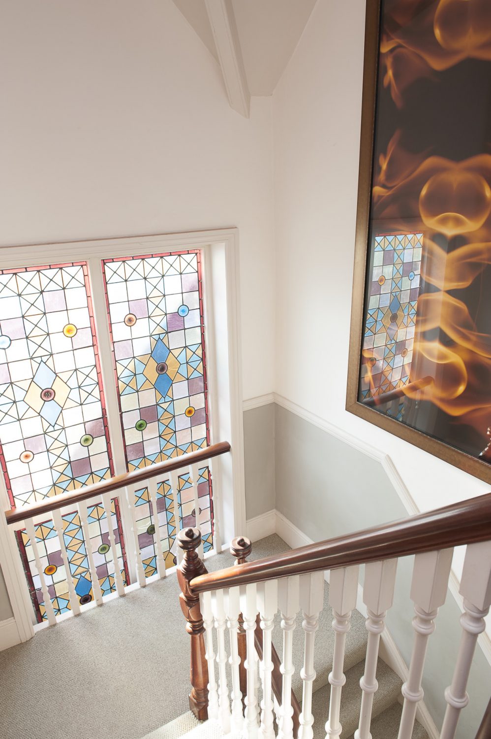 As we climb the stairs we come across a huge photograph of flames, manipulated using Photoshop into a giant fire design. The first room we enter is called Hafez. The room has a tranquil, airy feel and despite the fairly dark coloured walls is flooded by light from the huge bay window...