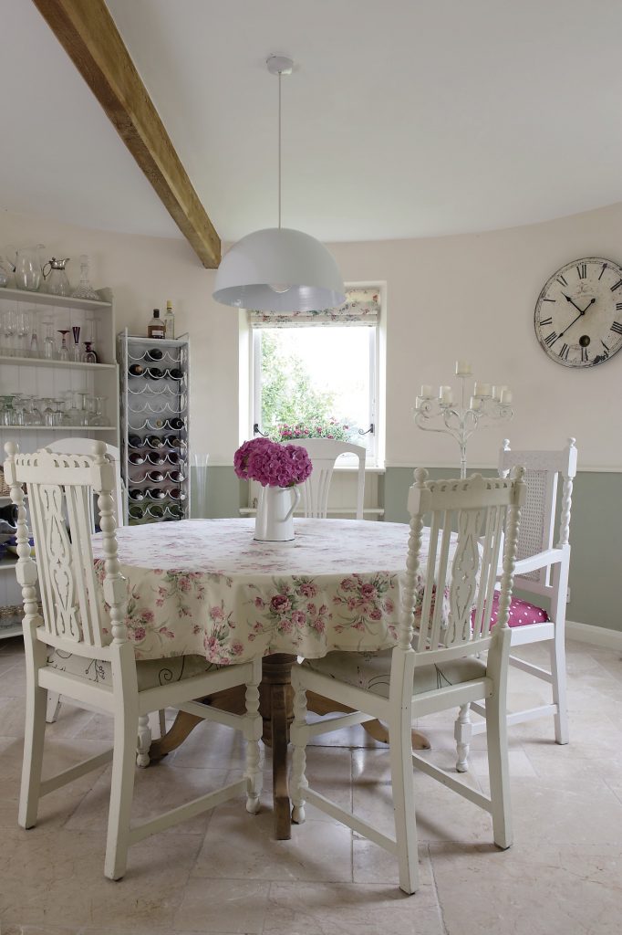 Originally the dining room roundel was accessed solely from the hallway but Katy has provided additional access from the kitchen. Here Katy has accentuated the space and height of the roundel by keeping furnishing to a minimum – just a wine rack and shelves to display her eclectic collection of glasses