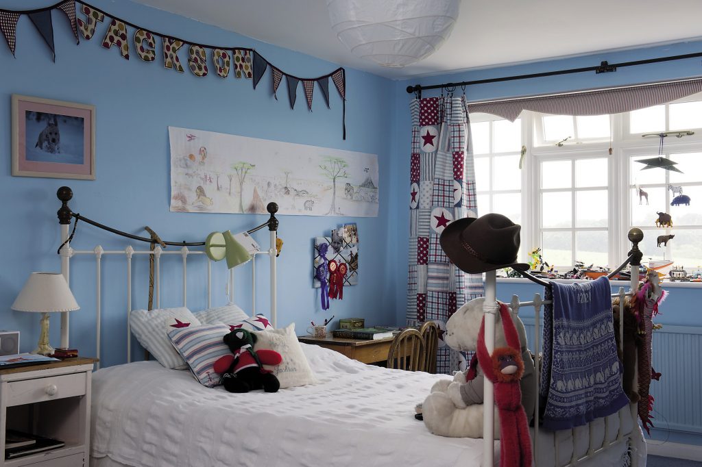 Son Jackson’s room looks like the lair of a budding explorer with its bold sky blue paint and pictures of exotic animals and placesSon Jackson’s room looks like the lair of a budding explorer with its bold sky blue paint and pictures of exotic animals and places