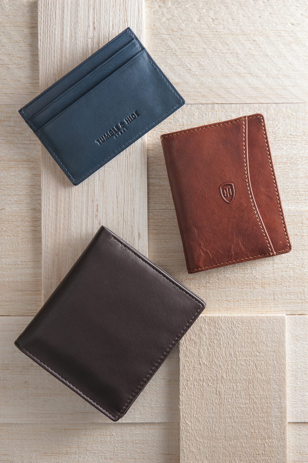 Tumble & Hide leather credit card holder, £21, leather travel pass holder, £19, 1642 two-fold leather wallet, £15, County Clothes, Canterbury 01227 765294 / Tenterden 01580 765159 / Reigate 01737 249224 www.countyclothesmenswear.co.uk