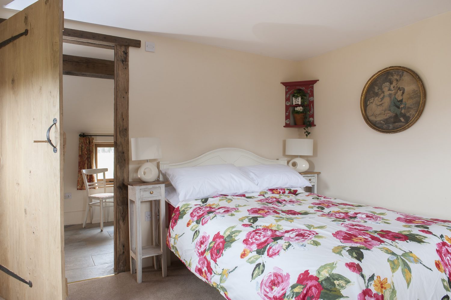 Downstairs in the main bedroom, two dining chairs have been painted white and recovered in Beaumont & Fletcher. Caroline found the corbel on one wall at Symonds Salvage in Pluckley and the distressed leather-topped writing desk at Rising Star in Tenterden