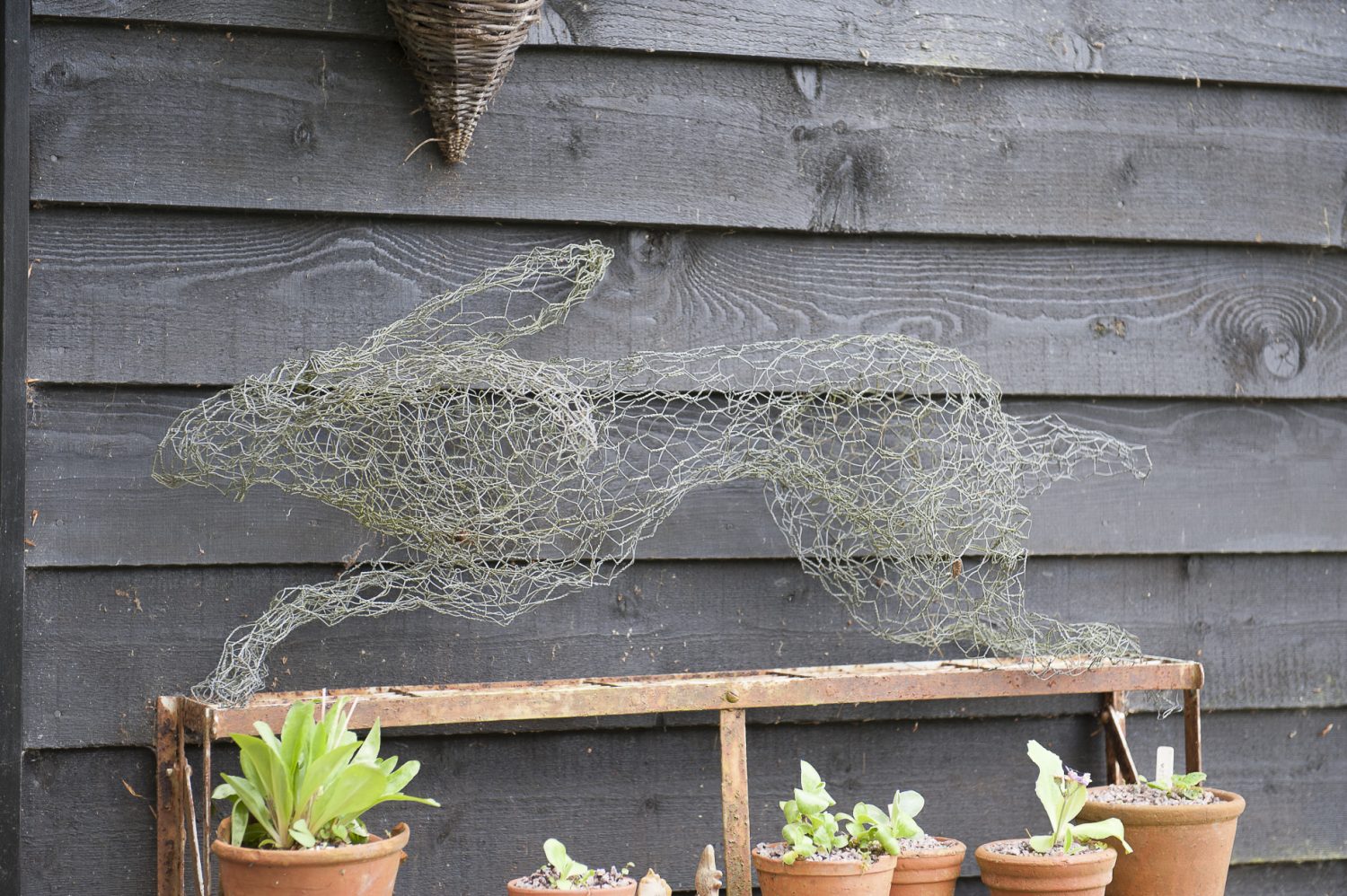 A chicken wire running hare was made for Wendy by artist Lucy Williams