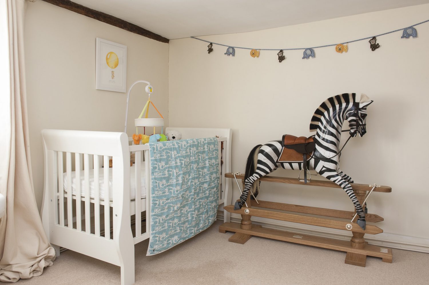 Baby Henry has his own Stevenson Brothers zebra rocking horse. Its soft black tail is made from that of one of Holly’s much loved horses that sadly passed away recently