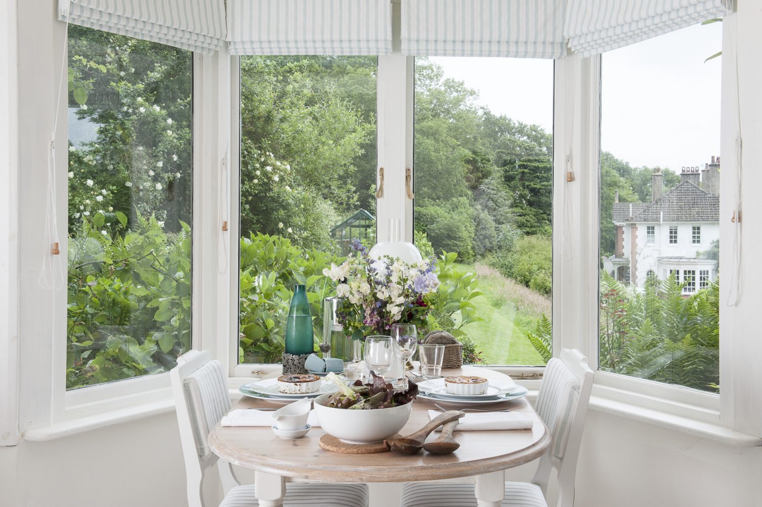 In the bay window is an intimate table for two she found at Mark Maynard in Tunbridge Wells