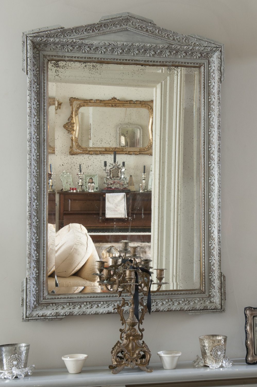 Antique mirrors are a prominent feature of Minnie’s home