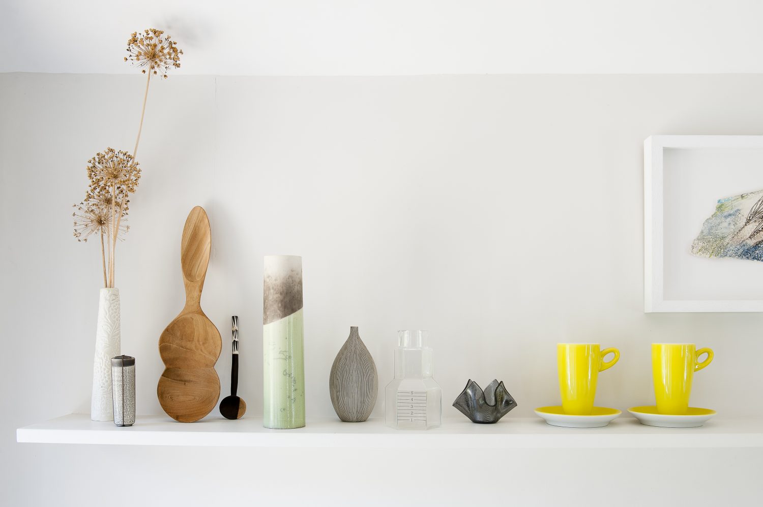 Karen’s new kitchen has opened up the whole house, making the space much more useable for the family. Ceramics by Kate Schuricht are mixed with other objects on a shelf above the sink