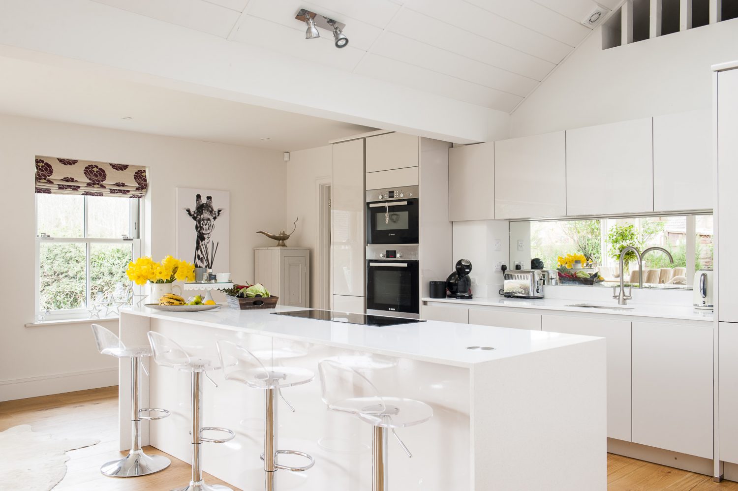 The spacious kitchen was designed and supplied by Martins of Hawkhurst. The panelled vaulted ceiling gives the Kittermasters’ home a beach-house feel